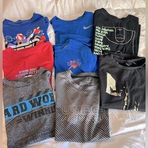 Lot of 8- short sleeved Youth Boys size 6/7 sports t-shirts.